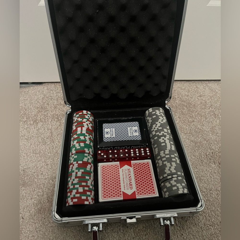 100 Chip Poker Set with 2 sets of cards, case, and dice.
